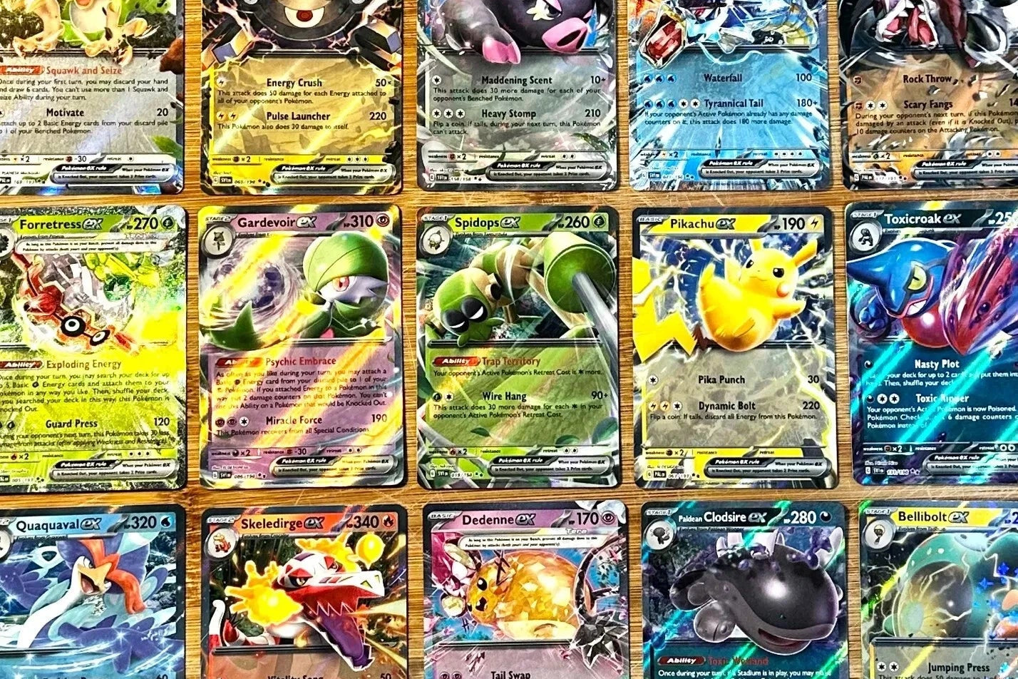 Collection of various trading cards displayed in a grid.